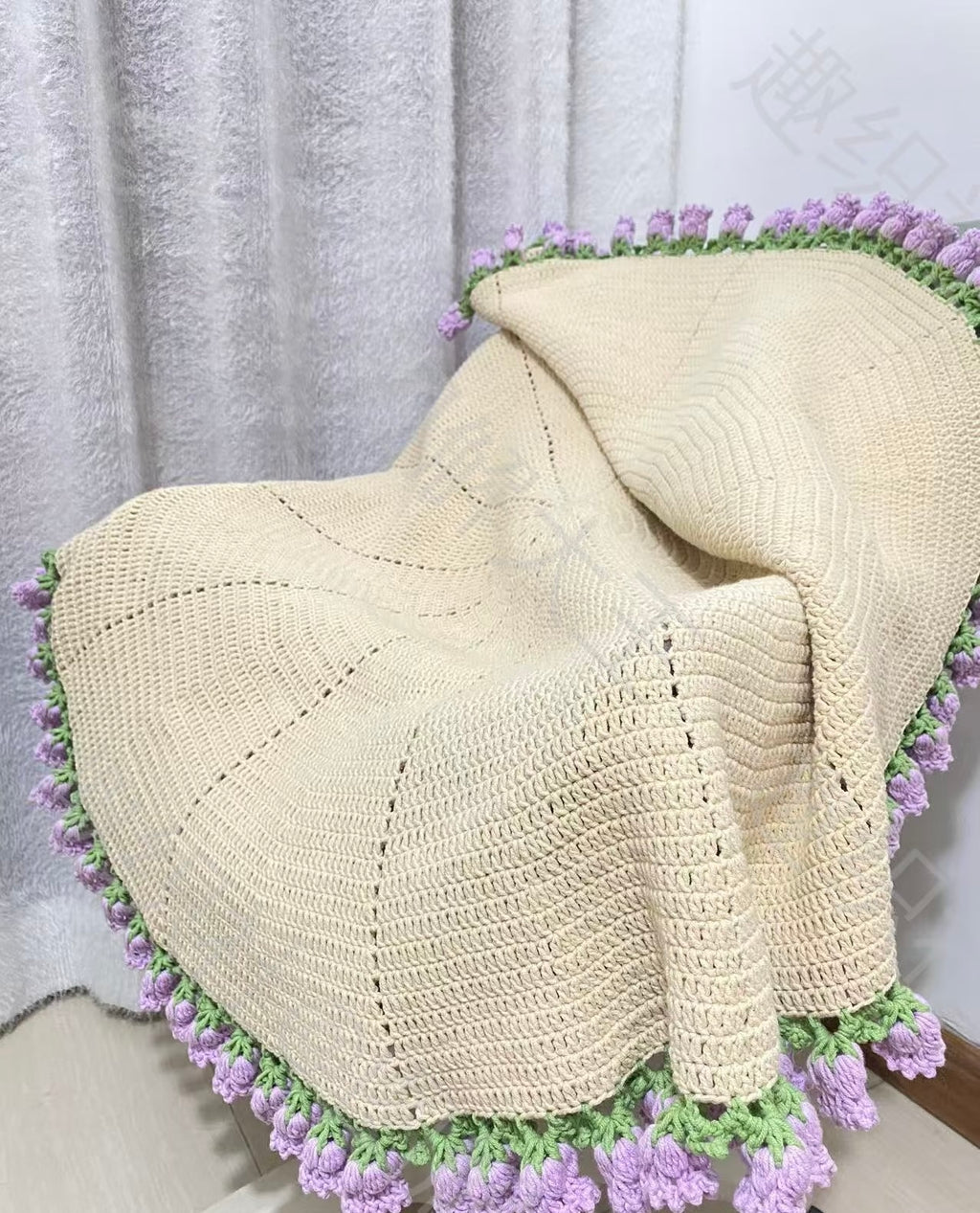 Finished Hand-crocheted lily of the valley flower round blanket
